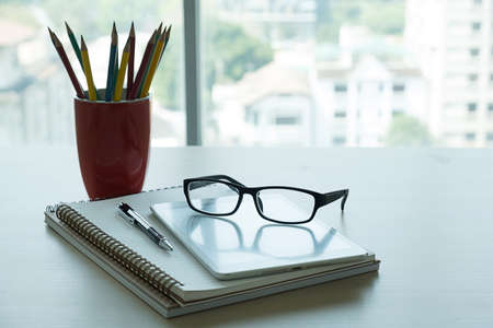 Close up of glasses and computer  business workplace work place in office