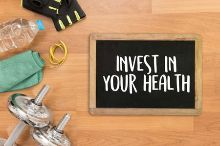 Invest in your health Healthy lifestyle concept with diet and fitness healthy foodの写真素材