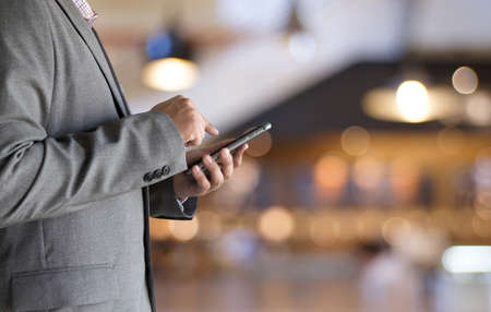 Close up of a man using   workplace using technology  new technology trendsの写真素材