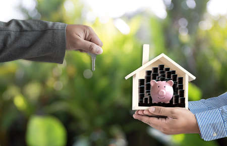 hands holding house homeless housing shelter  architecture  building  construction, real estate and propertyの写真素材