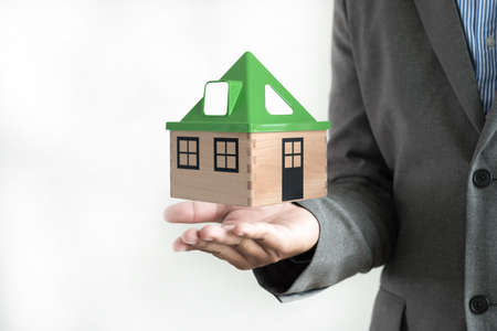 hands holding house homeless housing shelter  architecture  building  construction, real estate and propertyの写真素材