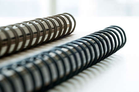 Extreme closeup of a spiral notebook closeup notepad as mockup for your design.の写真素材