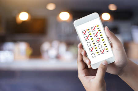 businessman SURVEY and Results Analysis Discovery Conceptの写真素材