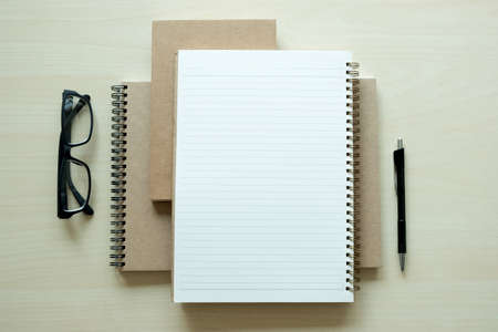 Top view of businessman  blank notebook business document black penの写真素材