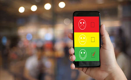 business man and woman select happy on satisfaction evaluation? And good mood smiley and evaluateの写真素材