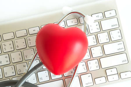 Red heart and a stethoscope Medical Equipment Healthcare medical insuranceの写真素材