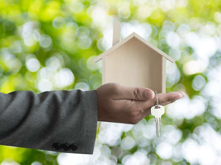 hands holding house homeless housing shelter  architecture  building  construction, real estate and propertyの写真素材