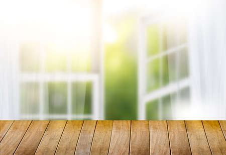 morning bright curtain window and empty table  blurred background can be used for display or montage your products and Mock upの写真素材