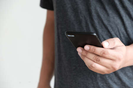 Close up man hands using smart phone Technology and phone technology trendsの写真素材