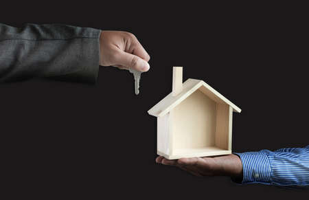 hands holding house homeless housing shelter  architecture  building  construction, real estate and propertyの写真素材