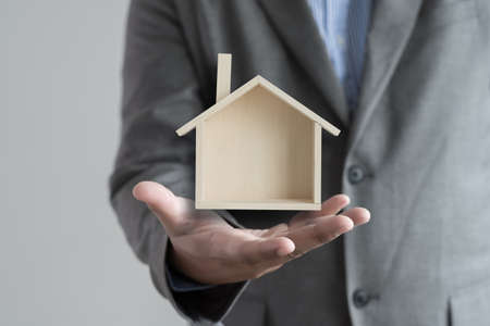 hands holding house homeless housing shelter  architecture  building  construction, real estate and propertyの写真素材