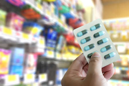 health care  holding at drugstore Pack birth control pills pharmacy drugstoreの写真素材