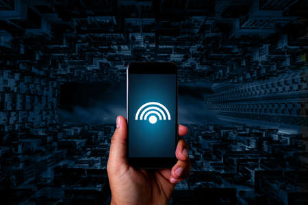 internet iot man  use smartphone internet of things technology (IoT) word diagram as conceptの写真素材