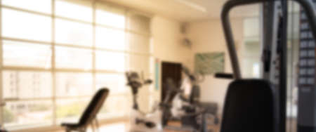Blurred of fitness gym background for banner fitness exercise concept