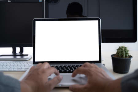Laptop with blank screen on table. Workspace background new project on laptop computer with blank copy space screen for your advertising text messageの写真素材