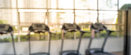 Blurred of fitness gym background for banner fitness exercise conceptの写真素材