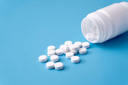 medicine  pills on blue background Copy space for text Assorted pharmaceutical Healthy Eating,...