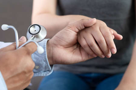 Medicine and health care concept Female patient at orthopedic medical examの写真素材
