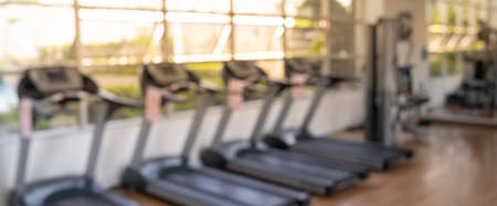 Blurred of fitness gym background for banner fitness exercise conceptの写真素材