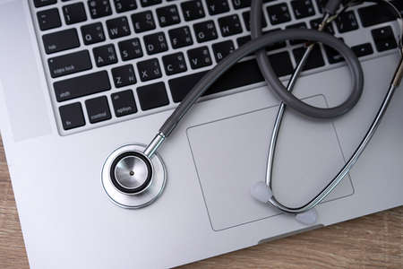stethoscope on laptop Doctor working in hospital Healthcare and medical concept test