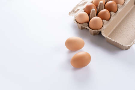 brown chicken eggs  raw chicken eggs in egg box healthy food and organic farming concept