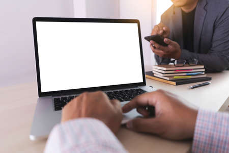 Laptop with blank screen on table. Workspace background new project on laptop computer with blank...