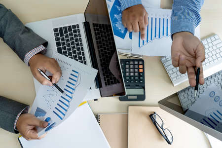 analyzing the work Accounting on Laptop  investment concept.の写真素材