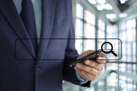 Businessman using Searching Browsing Internet internet of things (IoT)の写真素材