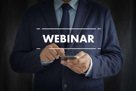 WEBINAR man hand on table Business, coffee, Split toneの写真素材