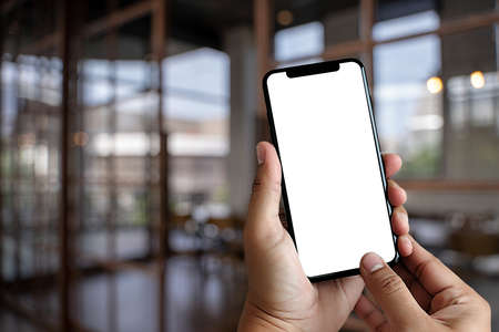 Close up man hands using smart phone Technology and phone technology trendsの写真素材