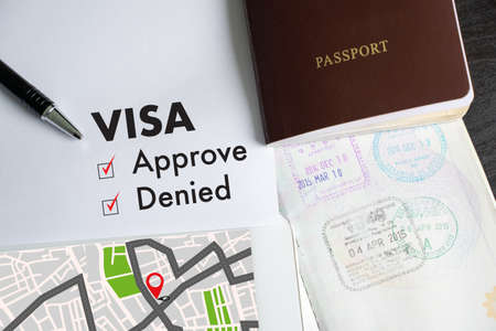 Visa and passport to approved stamped on a document top view in Immigration Visa approveの写真素材