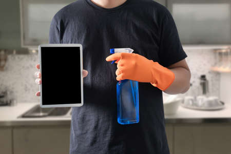 Close up  vacuum cleaner Man cleaning at homeの写真素材