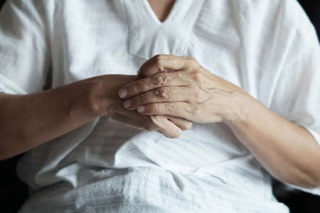 arthritis old person and Elderly woman female suffering from pain at home