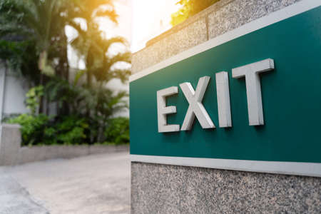 Closeup exit door Emergency Fire exit sign in condoの写真素材