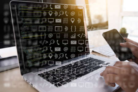man work Coding software developer programmer is coding on a desktop computerの写真素材