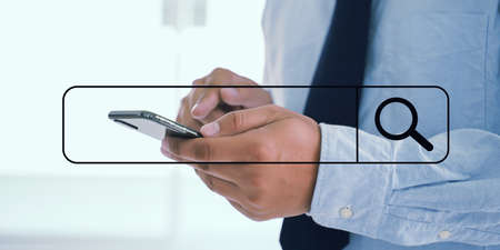 Businessman using Searching Browsing Internet internet of things (IoT)