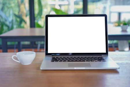blank white screen workspace, Laptop computer advertising text messageの写真素材