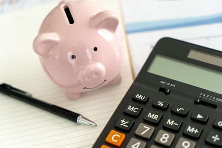 Finance Data analyzing with calculator  Economy Investment planning budgetの写真素材