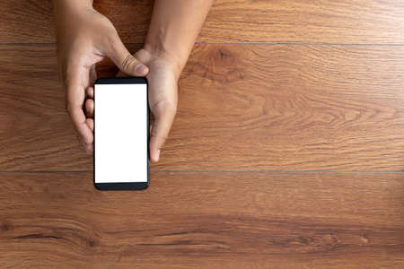 Man hand holding the black smartphone screen mockupの写真素材