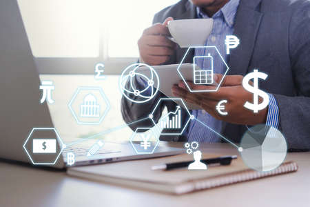 Man using  tablet computer  virtual interface graphic icons network diagram Digital marketingの写真素材