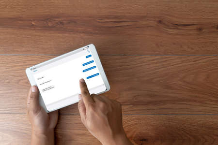 man using instant messaging app on mobile chatting with friends