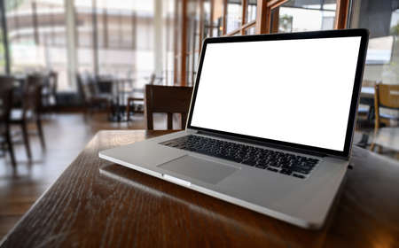 Mockup image of business Laptop with blank screen on table blank copy space screen for your advertising text messageの写真素材