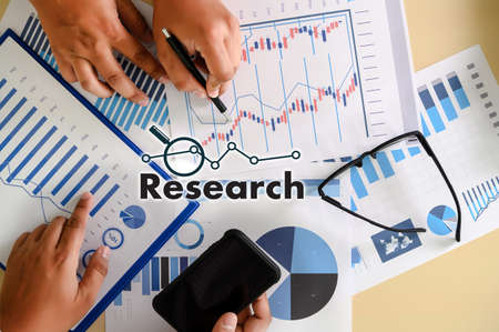 research documents with analytics data Brainstorm Meeting Businessman financial reportの写真素材