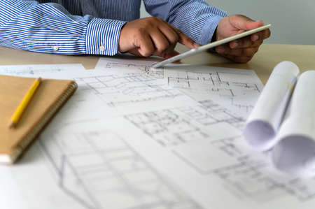 Architects working laptop  interior Architect workplace Construction concept tools
