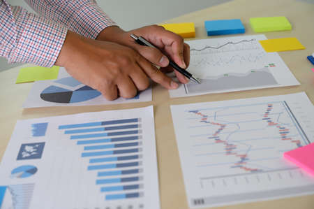 research stock market chart paper for analysis Brainstorm Meeting researchの写真素材