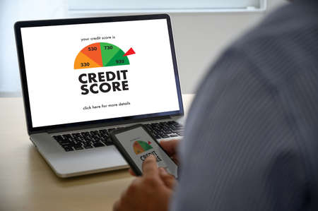 CREDIT SCORE (Businessman Checking Credit Score Online and Financial payment Rating Budget Money)の写真素材