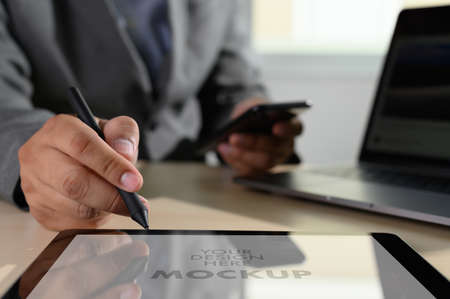 Laptop with blank screen on table. Workspace background new project on laptop computer with blank copy space screen for your advertising text messageの写真素材