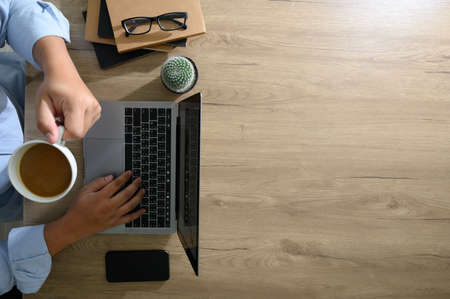 blank screen, flat lay tabletop office desk on wood Office desktopの写真素材