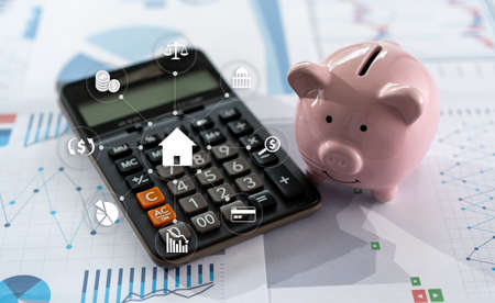 businessman working using a calculator finance accounting concept achievement to balance man assistant accountingの写真素材