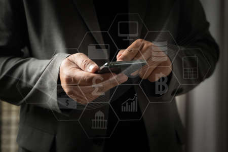 man use digital phone  typing on phone tablet smartphone Searching Browsing Internet internet of things (IoT)の写真素材